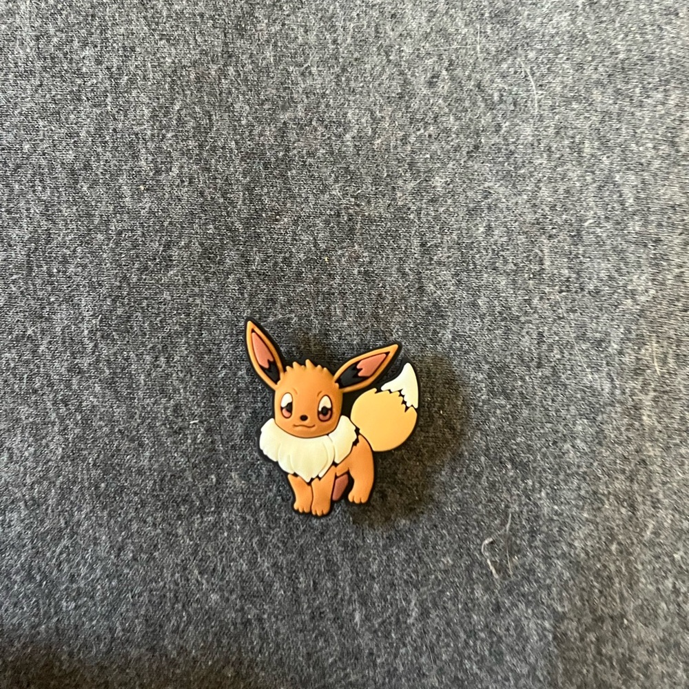 Pokémon Eevee Croc Charm never used!

(Bundle for a lower price)